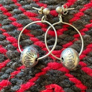 Sterling Navajo-made hoop earrings with stamped beads